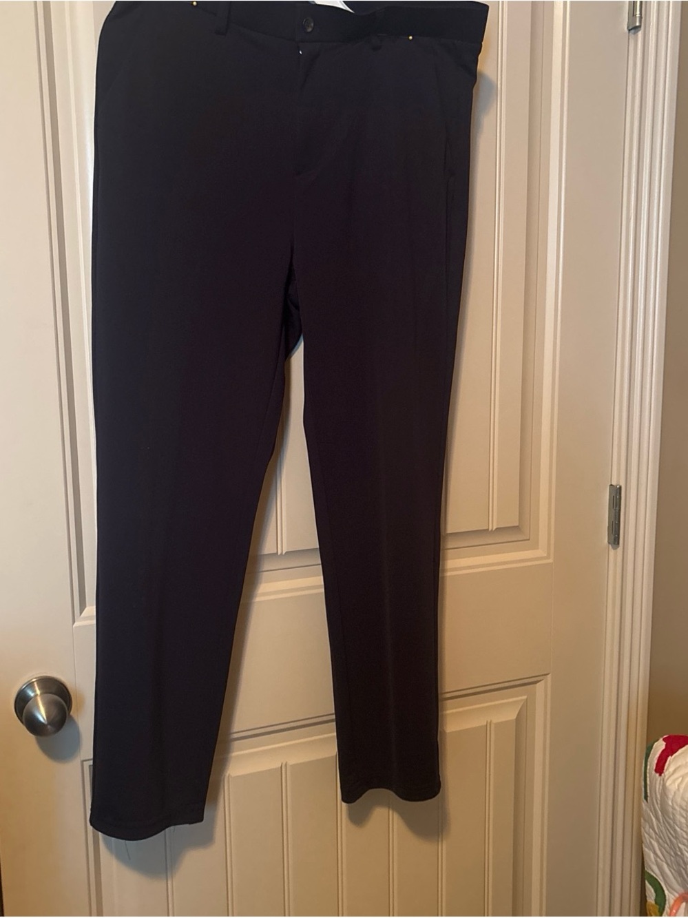 Amazon golf casual navy pants. 34x38. 90 percent polyester. 10 percent spandex.